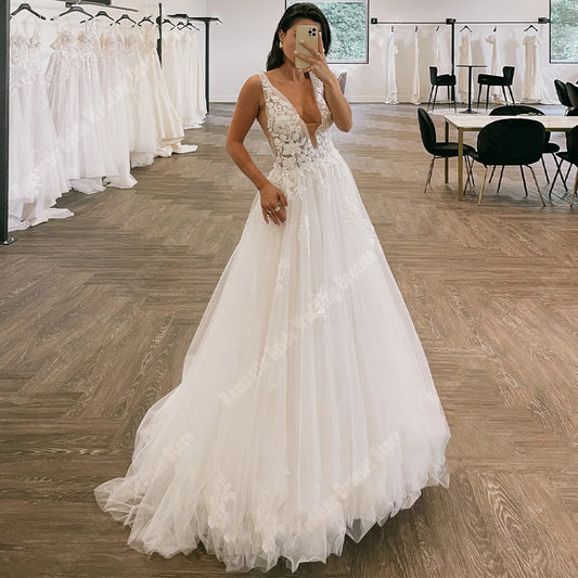 Optimize product title: Elegant Deep V-neck Wedding Dress - A-Line Bridal Gown for Princess-like Weddings - Mopping Length - Perfect for Celebrity Gatherings and Special Occasions - Vestidos De Novias