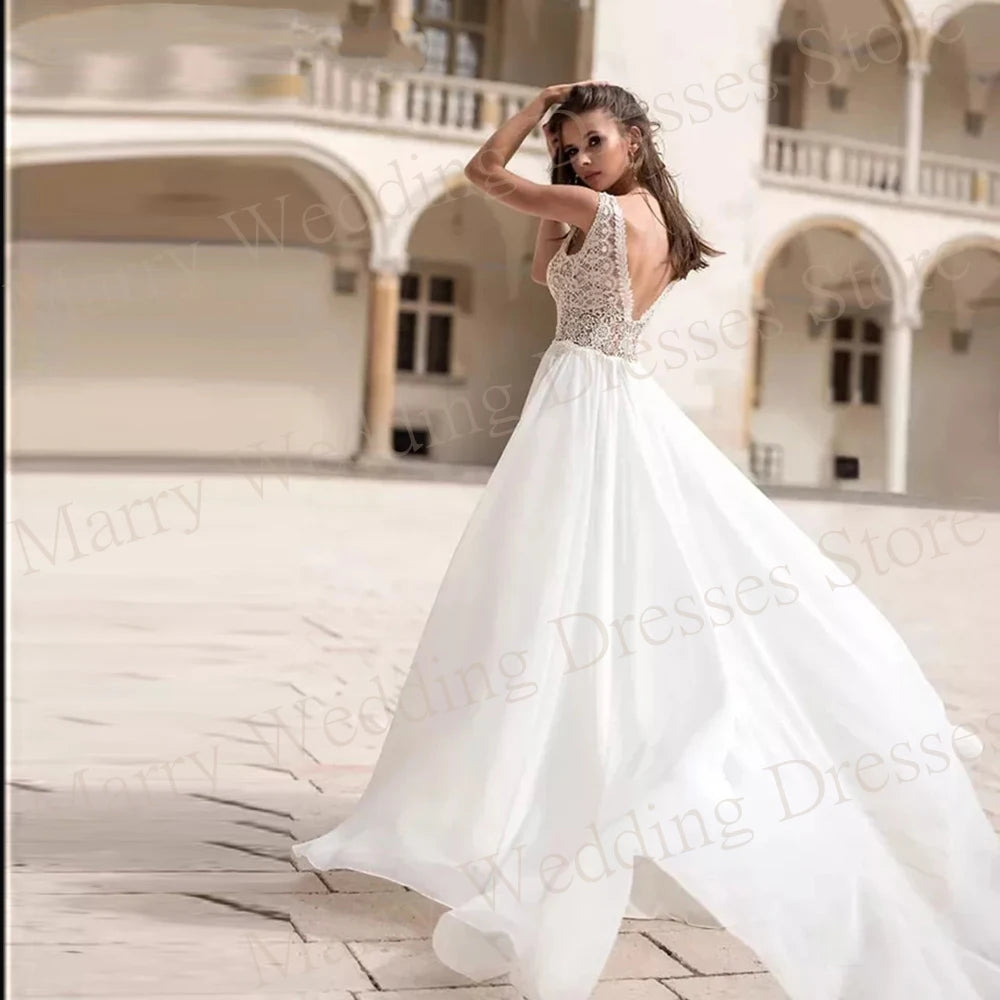 Optimize product title: Elegant V-Neck Chiffon Wedding Dress with Appliques Lace and Long Puff Sleeves - Graceful A-Line Cut, Sexy Backless Design - Perfect for Brides - Available in Various Sizes